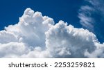 Blue sky fluffy white clouds on summer season bright clear skyline with beautiful cloudscape. Panorama blue sky clouds pattern on daylight with copy space. Cumulus cloudscape air climate sunny day