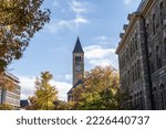 Small photo of Ithaca, New York-October 25,2022: McGraw Tower with colorful fall foliage background on the Cornell University campus