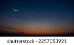 Small photo of Crescent moon on dusk sky twilight after sundown, religion of Islamic well editing text Ramadan Kareem, Eid al Fitr, Eid Mubarak, Eid Al Adha, Muharram on free space background