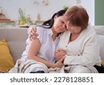 Small photo of happy elderly mother chatting with her smiling middle-aged daughter. positive impact of social connections on mental health, particularly for older adults combating loneliness and depression.
