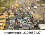 Small photo of Lagos State, Nigeria - 30 Nov 2011 - Nigerian Youths selling their goods inside Lagos traffic, Nigeria.