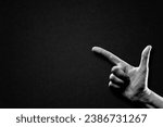 Hand pointing sign in black and ...