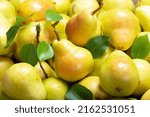 close up of fresh ripe pears as background