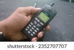 Small photo of Ngawi, 11 juli 2017, My first cell phone that can only be used for telephone calls and short message services with a monophonic ringtone and thick design and still uses a large external antenna