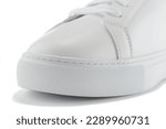 White men's sneakers on a white background. Detailed pictures. A pair. A single sneaker.