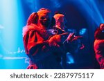 Small photo of Here are a scary clown creepy clown two clowns and creepy halloween clown family portrait on blue