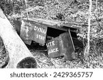 Small photo of Black and white photo of vintage dynamite rail car