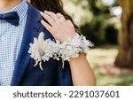 Small photo of corsage on arm of school leaver
