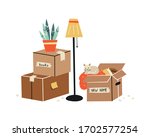 moving to a new home. the... | Shutterstock .eps vector #1702577254