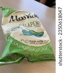 Small photo of Orlando, Florida- August 19, 2023 - Isolated picture of Miss Vicky's Jalapenos chips on the table