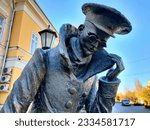 Small photo of Taganrog Rostov region, Russia - 10.30.2021. Genre sculpture Man in a case based on Chekhov's short story
