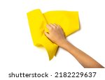 Small photo of Cleaning cloth in hand isolated. Wipe yellow rag, cleaning microfiber towel, wiping cotton napkin, microfibre fabric for cleanliness, kitchen cloths on white background