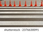 Small photo of Road Works Cone, Construction Cone, Red Plastic Warning Sign, Road Witches' Hat, Channelizing Cone on Street, Safety Traffic, Many Road Cones on a Pedestrian Crossing