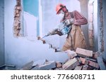 Worker With Demolition Hammer...