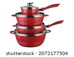 Small photo of set of red utensils for cooking, stacked one on top of the other, on a white background, isolate