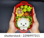 Small photo of the puppy-shaped lunch box comes with charsiu chicken, eggs with sausage and grapes as a complement.