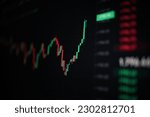 Small photo of Stock graph with green candle spike