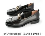 Small photo of Loafers isolated on white background. Pair of Stylish Expensive Modern Leather Black Loafers Shoes. Fashion concept with woman shoes on white.