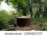 Small photo of Charcoal Burner in a Hazel Coppice