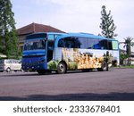 Small photo of GSP, Saturday, 27 Mar 2010. The HARAPAN JAYA tourism bus is parked at the Graha Sabha Pramana parking lot, UGM, Yogyakarta.