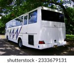 Small photo of GSP, Monday, 5 Apr 2010. A tourist bus with a classic model is parked at the Graha Sabha Pramana parking lot, UGM, Yogyakarta.