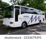 Small photo of GSP, Monday, 5 Apr 2010. A tourist bus with a classic model is parked at the Graha Sabha Pramana parking lot, UGM, Yogyakarta.