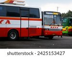 Small photo of Sunday, March 28, 2010. A RAYA bus that has just arrived will park next to a RAYA bus that is already standing by in the rest area of ​​Tirtonadi terminal, Solo.