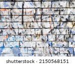 Small photo of Trash brick wall. Multilayer paint. Colored label layers. For background, ad background