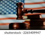 Wooden gavel and flag of united ...