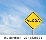 Small photo of Yellow transportation sign with word ALCOA (Abbreviation of Attributable, Legible, Contemporaneous, Original and Accurate) on blue color sky background