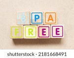 Small photo of Color letter block in word BPA (Bisphenol A) free on wood background