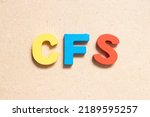 Small photo of Color alphabet letter in word CFS (Abbreviation of Container Freight Station, Certified fund specialist or Chronic fatigue syndrome) on wood background