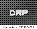 White alphabet letter in word DRP (Abbreviation of Disaster recovery plan, Distribution resource planning, Dividend reinvestment plan, Direct Repair Program or Digital Remaster Processing) on pegboard