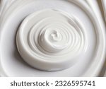 A Close-Up Shot of White Liquid Swirl