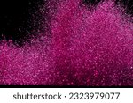 Small photo of Explosion metallic pink glitter sparkle. Choky Glitter powder spark blink celebrate, blur foil explode in air, fly throw pink glitters particle. Black background isolated, selective focus Blur bokeh