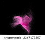 Small photo of Pink Sand flying explosion, particle dot grain wave explode. Abstract cloud fly. Choky pink colored sand splash throwing in Air. Black background Isolated series two of images
