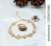 Small photo of Beautiful pearl ring, bracelet, and brooch
