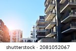 Small photo of Abstract fragment of contemporary architecture. Residential area in the city, modern apartment buildings
