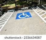 The line that hits up the parking lot area to facilitate people with disabilities in wheelchairs.