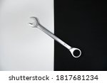 Wrench for car repair on a black-white background. 18mm spanner