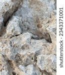 Small photo of Rocks with canvass and cracks