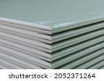 Green Gypsum plasterboard Drywall with moisture water resistant additives in the core that resists high wet humidity, use in Kitchens and Bathrooms.