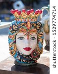 Small photo of Sicilian Ń�eramic vase Queen in the form of head (Moors head) in the vintage market. Sicilian tradition art