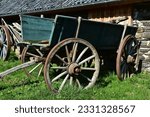 Small photo of Old barrow for horses or oxen made of wood and iron