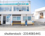 Small photo of POHANG,SOUTH KOREA,OCTOBER 20, 2022: Woman traveller is sightseeing at Yoon Hye Jin’s (Shin Min Ah) Dental Clinic from Korean Series “Hometown Cha-Cha-Cha”