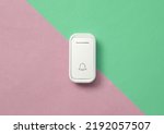 Doorbell on a colored background. Minimalism