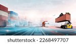 Small photo of Container handler forklift loading at the docks to truck with stack of colorful containers box background and copy space, Cargo freight shipping import export logistics transportation industry concept