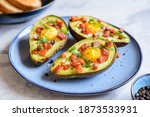 Roasted Avocado Egg Boats With...