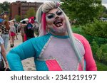 Small photo of Providence, RI, USA - June 17, 2023: Drag queen performer smiling at pride fest