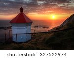 Norwegian lighthouse during the midnight sun
